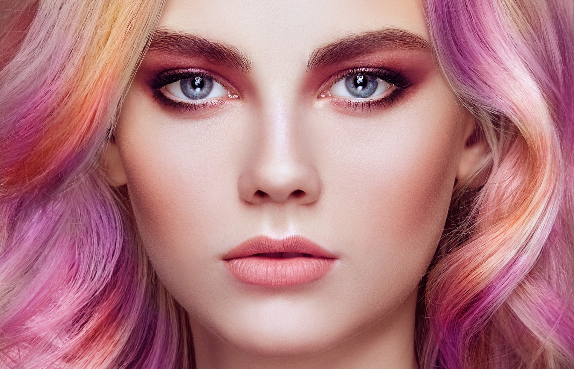 Beauty fashion model girl with colorful dyed hair