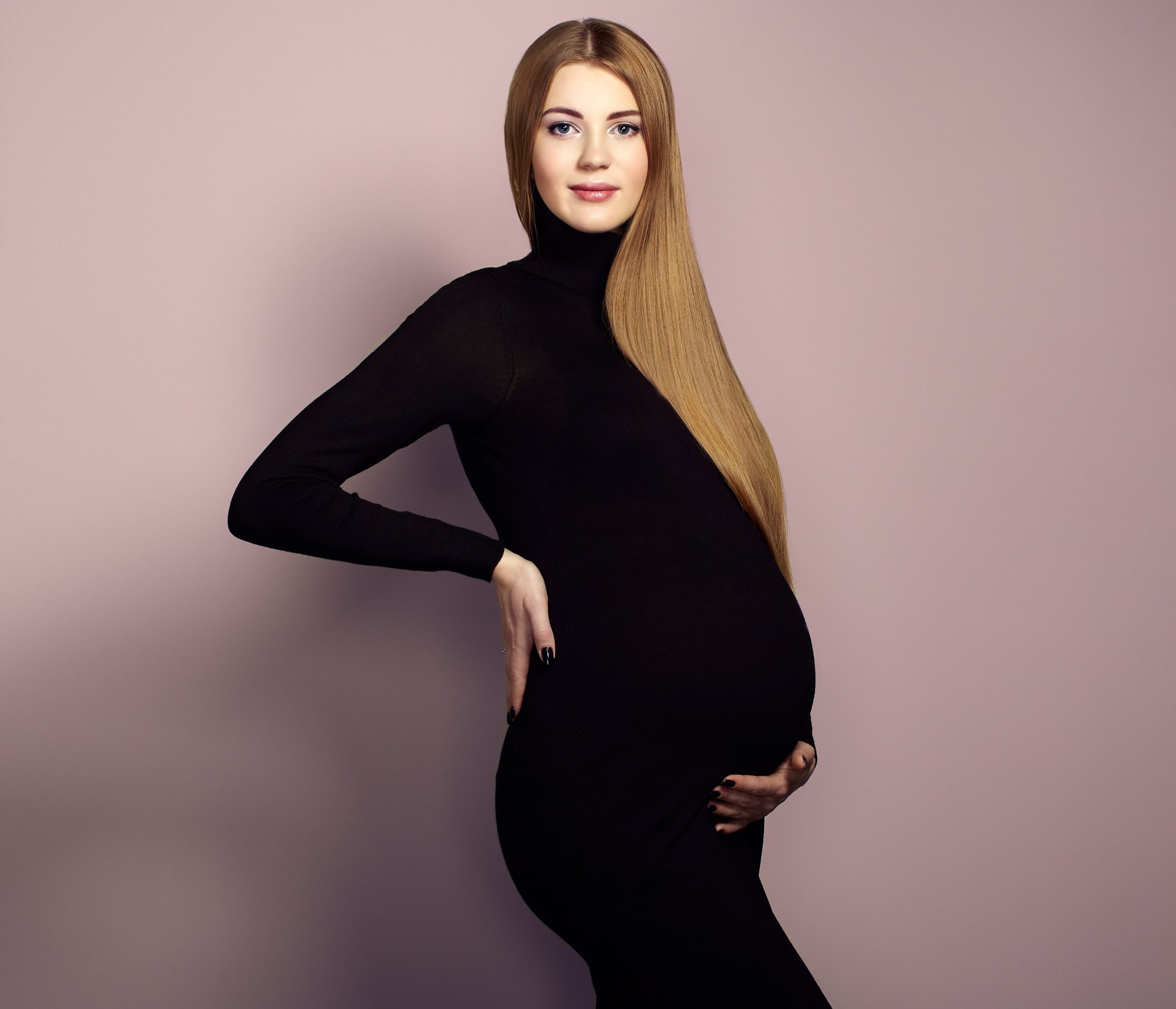 Portrait of the young pregnant woman